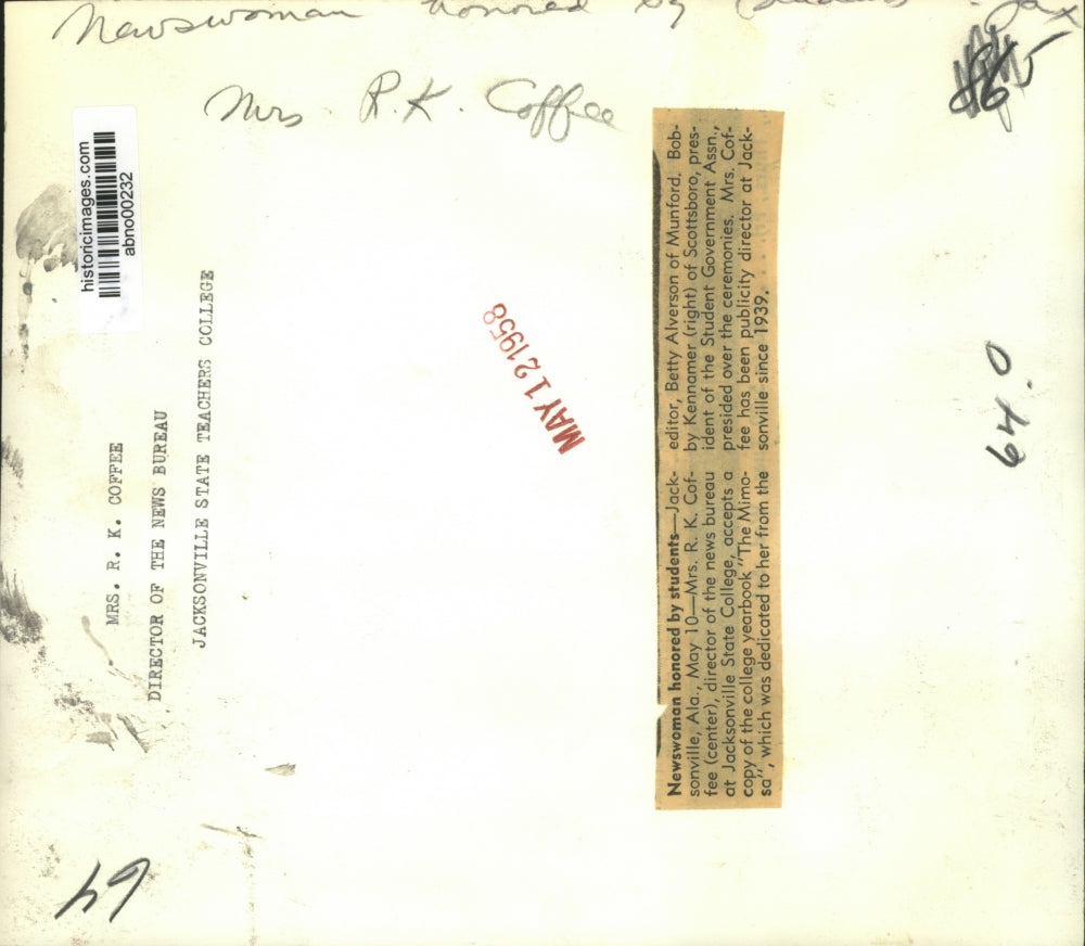 1958 Press Photo Mrs. R. K. Coffee accepts yearbook from Betty Alverson, Alabama