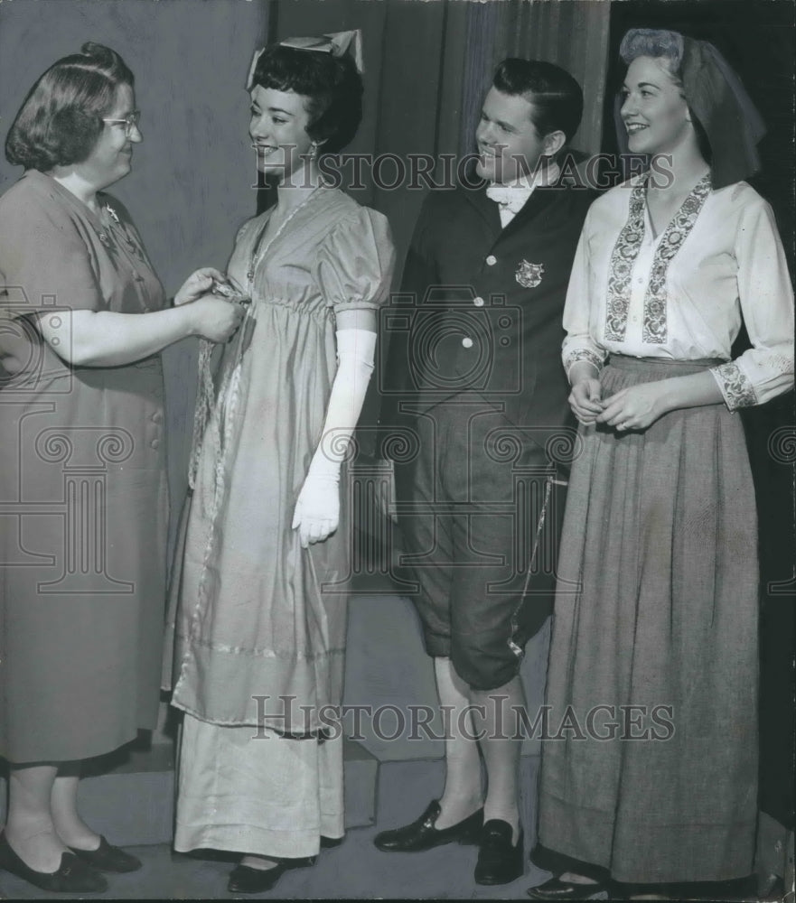 1961 Press Photo Carol Howard, Byron Jones, Others get into costume for Opera- Historic Images