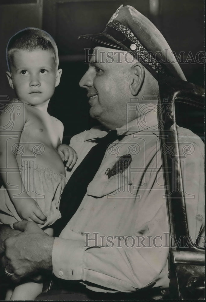 1954 Press Photo M. A. Jones, Police Officer with boy - abno07780
