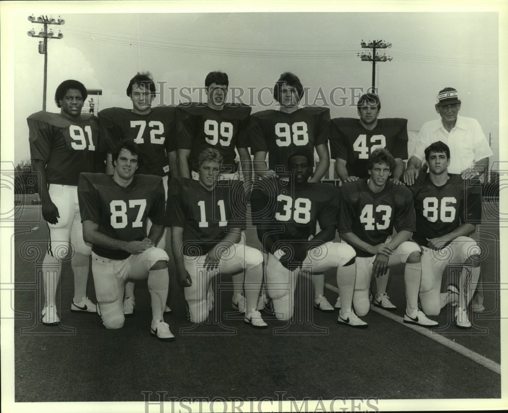 1981 Press Photo Two Rows of Football Players with Coach - abns07327- Historic Images