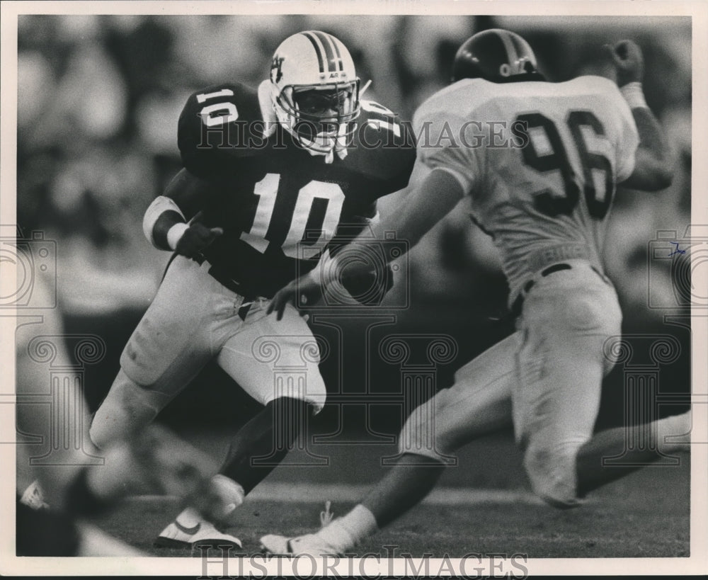 1989 Press Photo Alabama-Auburn football players James Joseph and #96 Tony Pogue - Historic Images