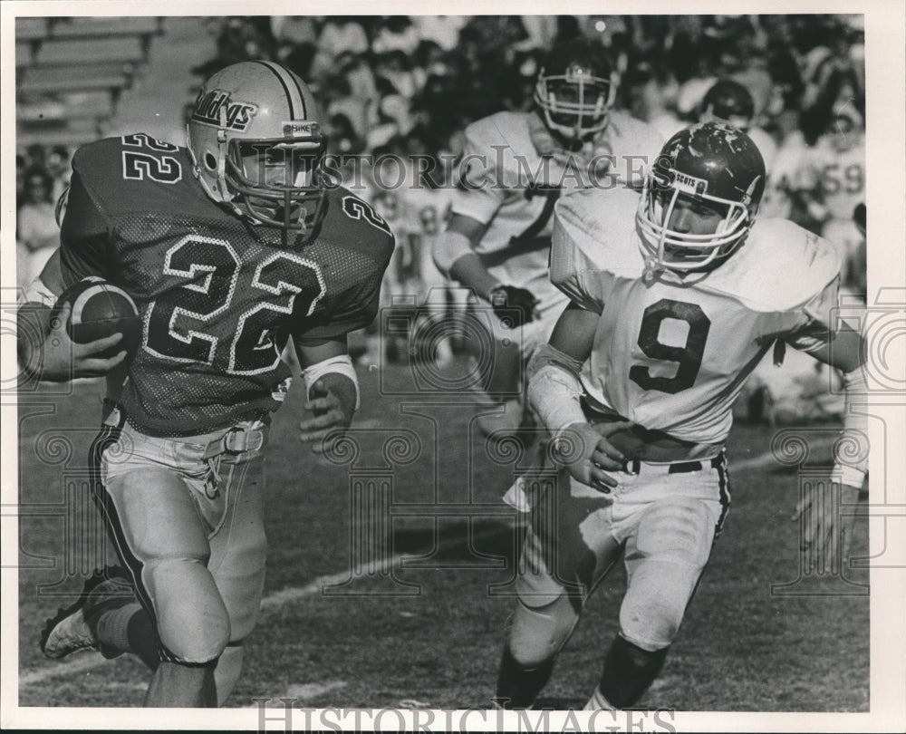 Press Photo Alabama-Samford player #22 gains 8 yards against Merryville. - Historic Images