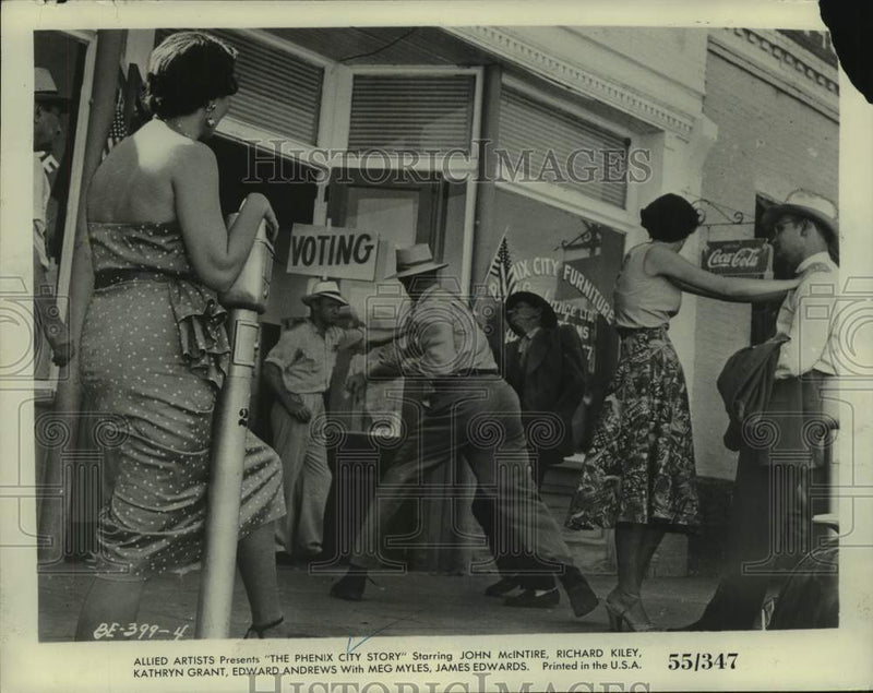 Load image into Gallery viewer, 1956 Press Photo Commotion on Street in "The Phenix City Story" - abnx02970
