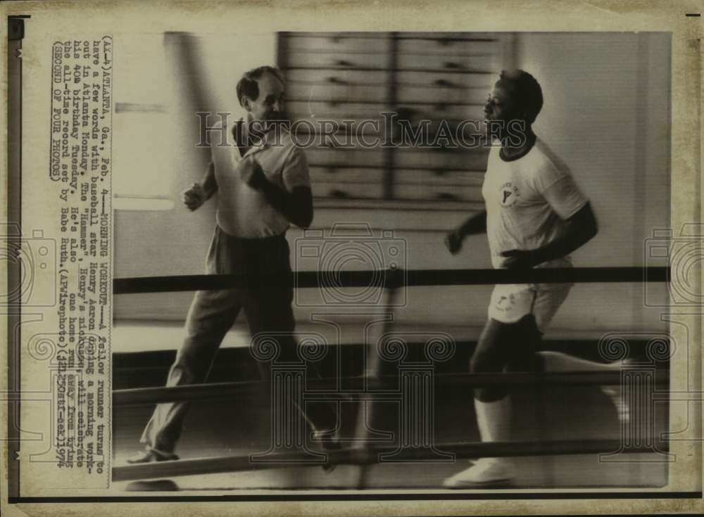 1974 Press Photo Baseball Player Henry Aaron Runs Next to Other Man - abnx02987 - Historic Images