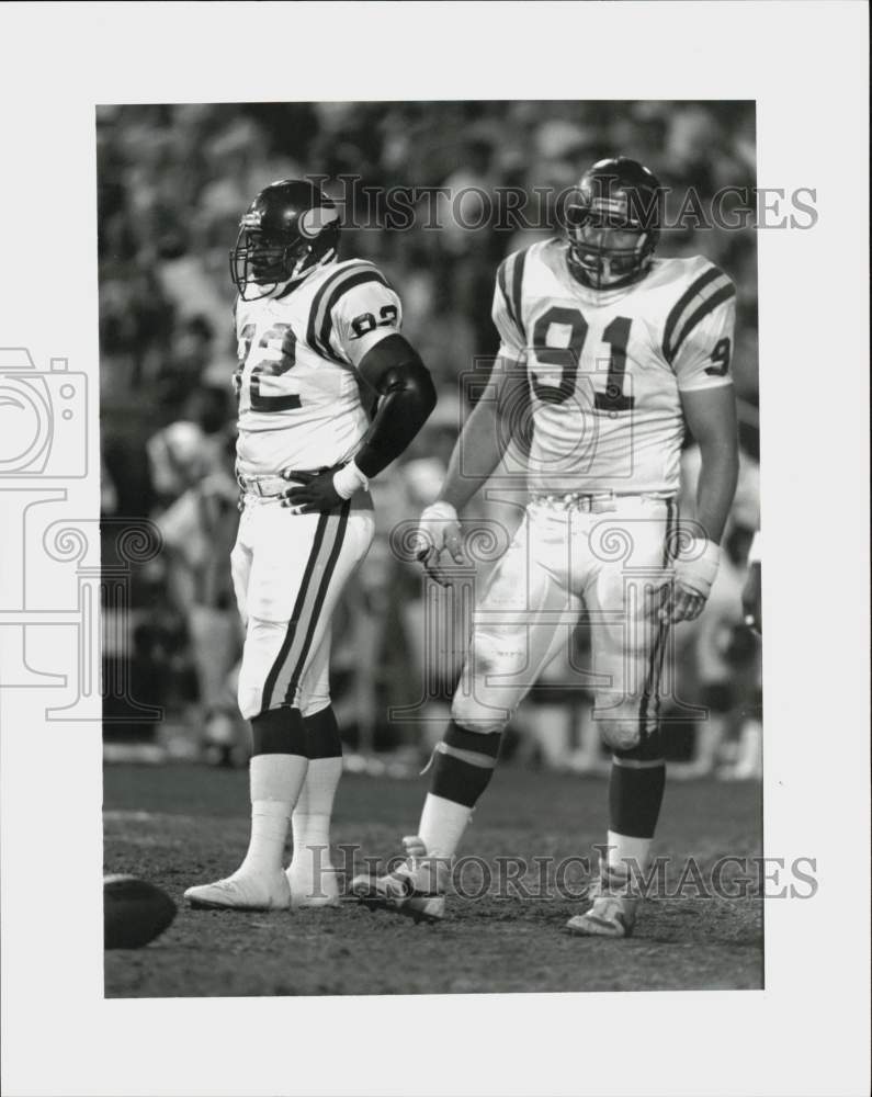 1987 Press Photo Minnesota&#39;s Stafford Mays #92 &amp; Joe Phillips #91 in Denver - Historic Images