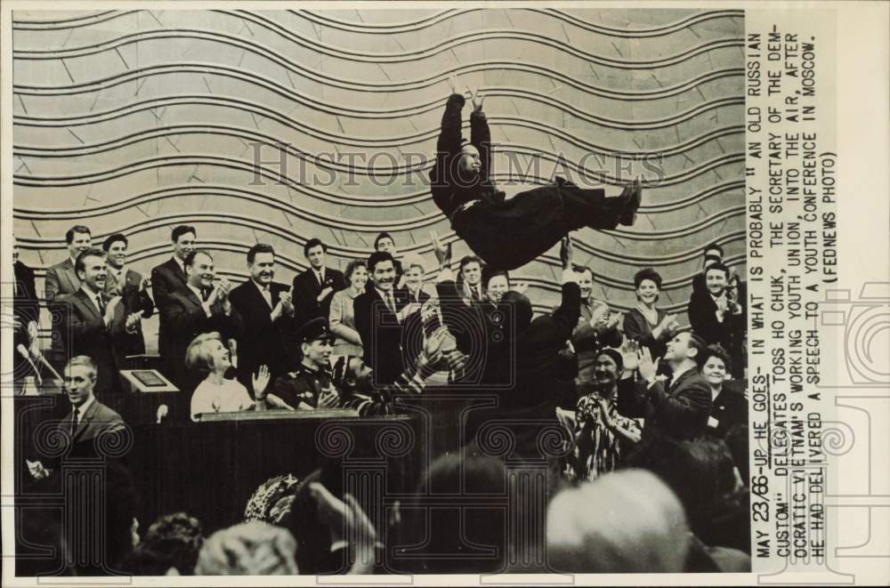 1966 Press Photo Ho Chuk is tossed into the air at youth conference in Moscow - Historic Images