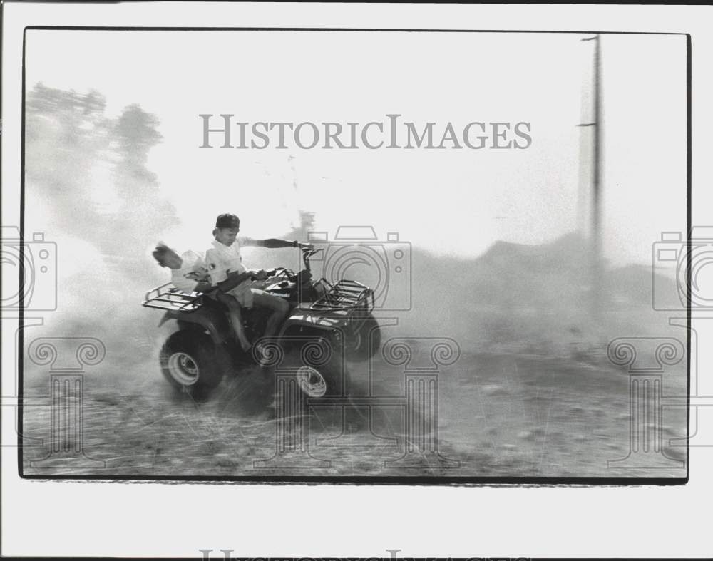 1991 Press Photo Josh Celigoy &amp; John De Jong riding an four-wheeler in Enumclaw - Historic Images