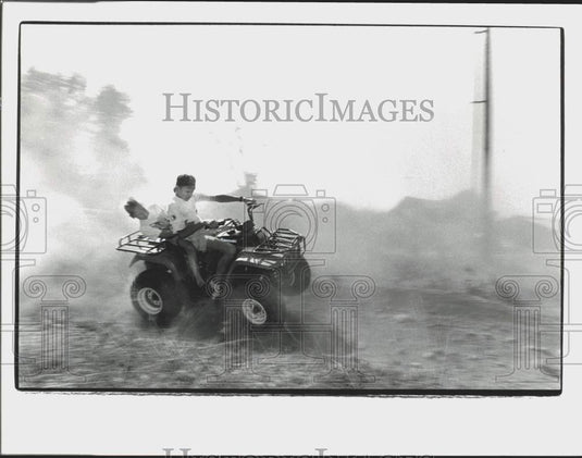 1991 Press Photo Josh Celigoy & John De Jong riding an four-wheeler in Enumclaw - Historic Images
