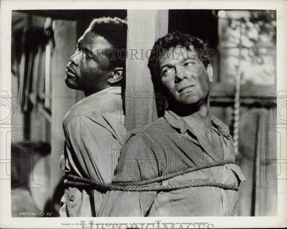 1958 Press Photo Sidney Poitier and Tony Curtis star in &quot;The Defiant Ones.&quot; - Historic Images