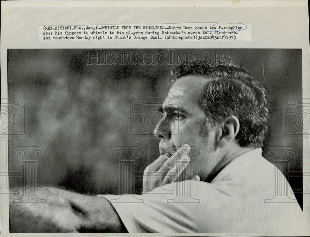 1973 Press Photo Ara Parseghian whistles to his players in Miami's Orange Bowl- Historic Images