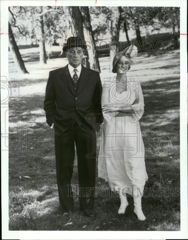 1984 Press Photo Actor Robert Mitchum, Actress Virginia Madsen In Romance Drama - Historic Images