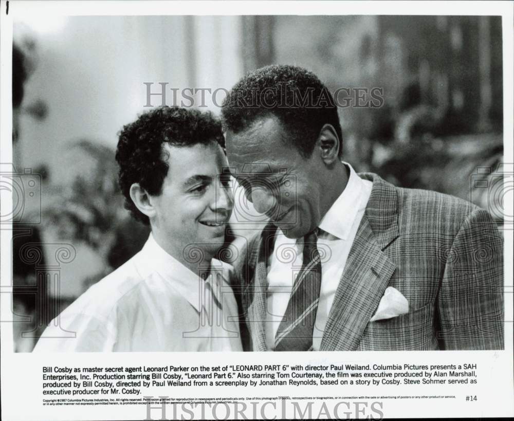 1987 Press Photo Bill Cosby and Paul Weiland on set of &quot;Leonard Part 6&quot; - Historic Images