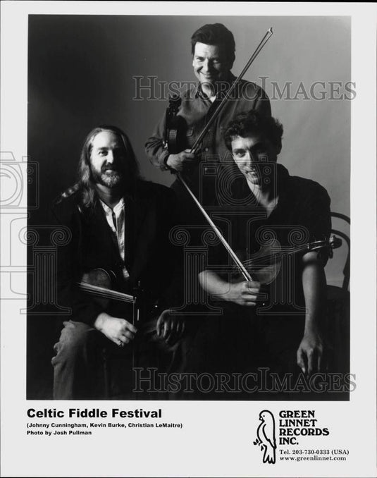 2002 Press Photo Members of the band Celtic Fiddle Festival - afx23441 - Historic Images