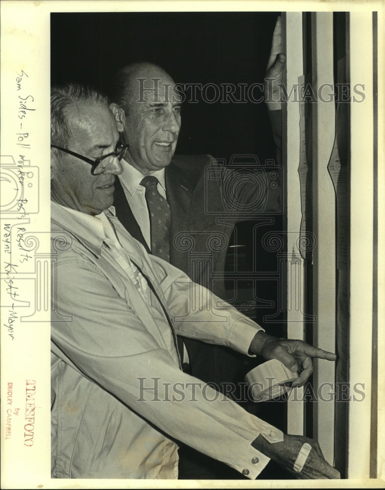 Press Photo Sam Sides, Poll Worker, Posts Results, with Mayor Wayne Knight- Historic Images