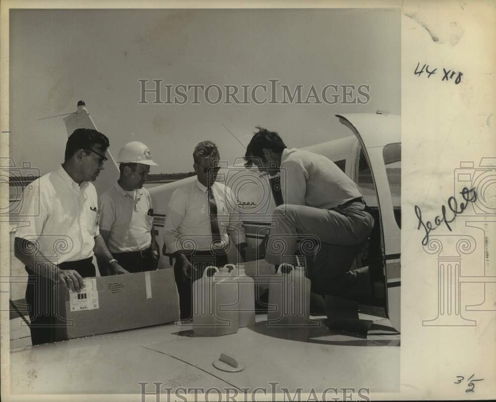 1969 Press Photo Supplies &amp; leaflets flown in for Hurricane Camille victims- Historic Images