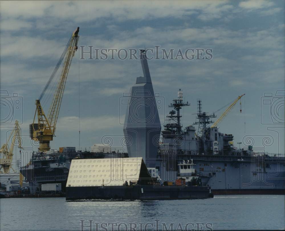 Press Photo Cranes assist construction of a ship at Ingalls Shipbuilding- Historic Images