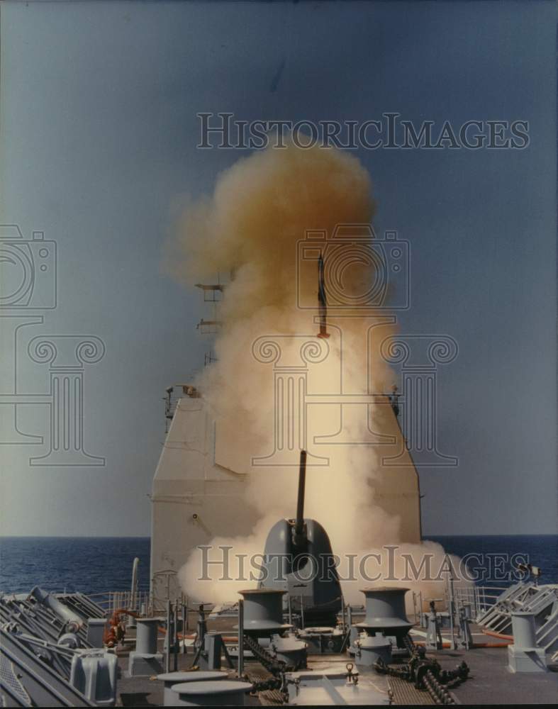 Press Photo USS Bunker Hill fires missile over the ocean - ampa01229