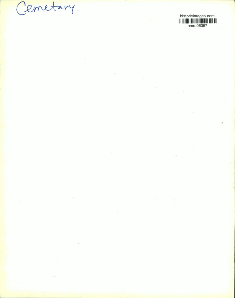 Press Photo Woman holding baby stands at gravestone at Alabama cemetery