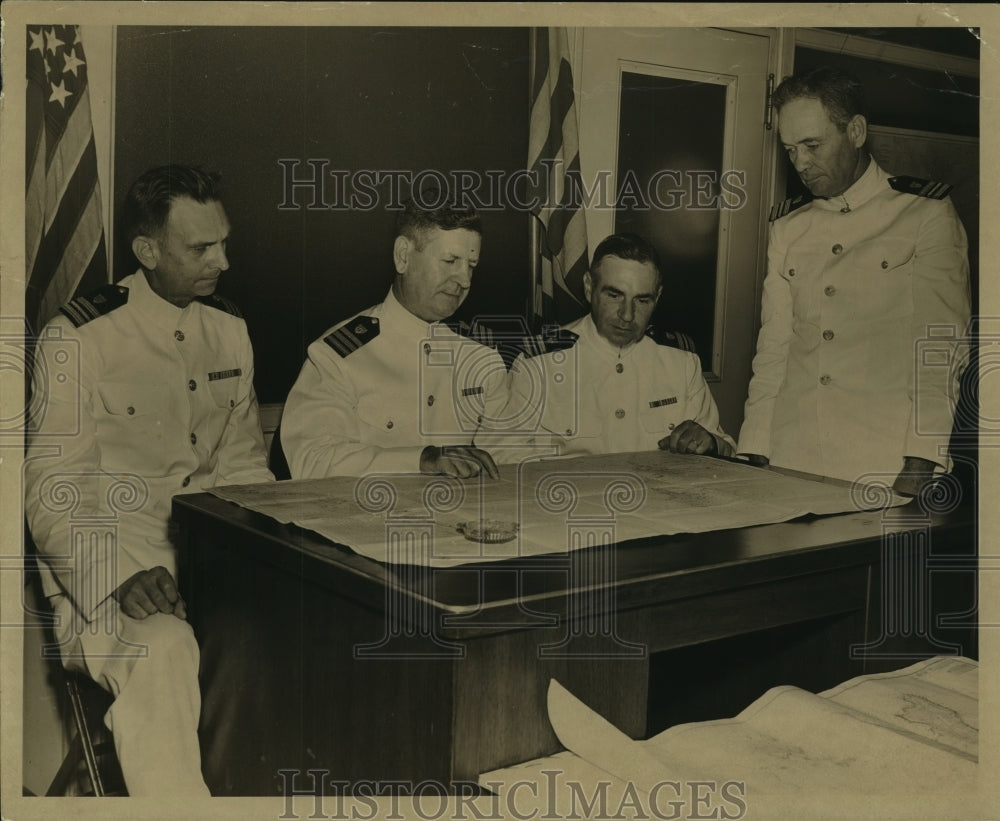 Press Photo U. S. Coast Guardsmen review map in Alabama - Historic Images