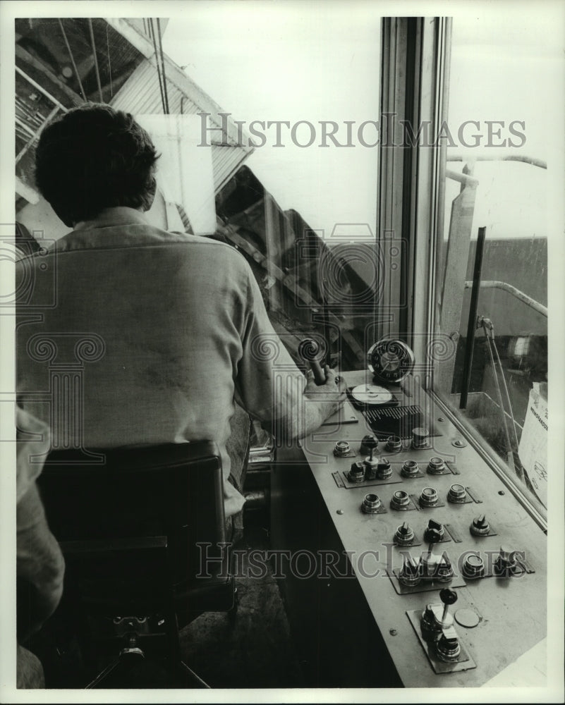 Press Photo Control-board operator at work at Mobile waterfront, Alabama- Historic Images