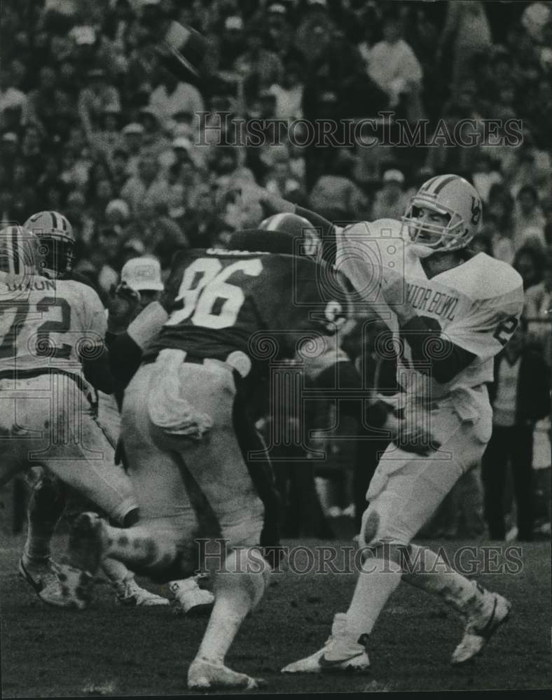 1987 Press Photo Leon Seals on Field With Opponent, Senior Bowl, _x005F_x0010_Alabama- Historic Images