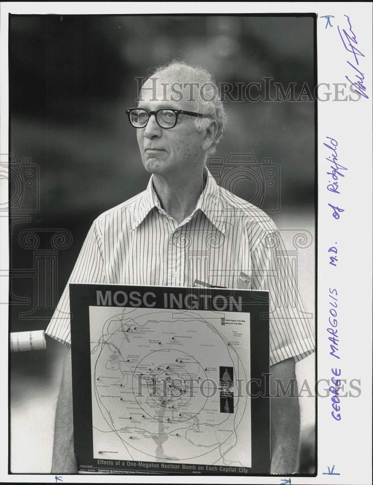 Press Photo Dr. George Margolis of Ridgefield holds bomb target map - ctca01942- Historic Images