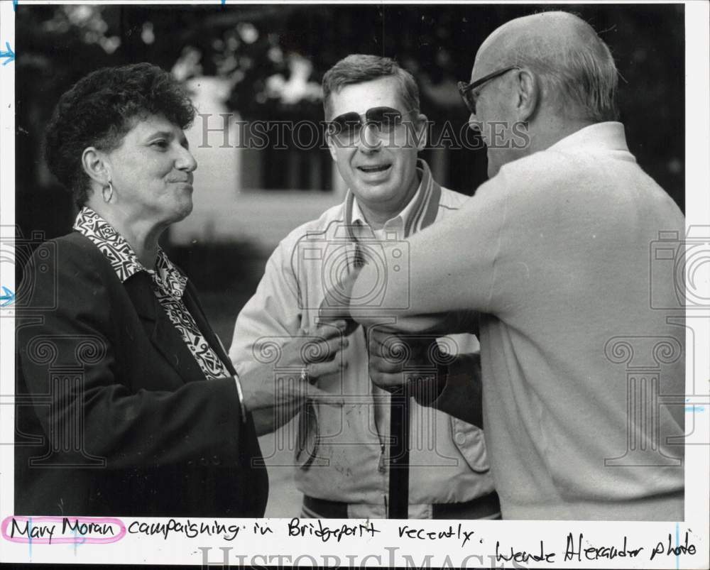 Press Photo Mary Morgan greets residents during her campaign in Bridgeport- Historic Images