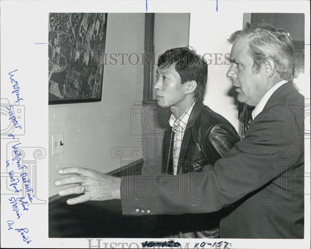 Press Photo Suspect John Chung and detective at police station in Westport- Historic Images