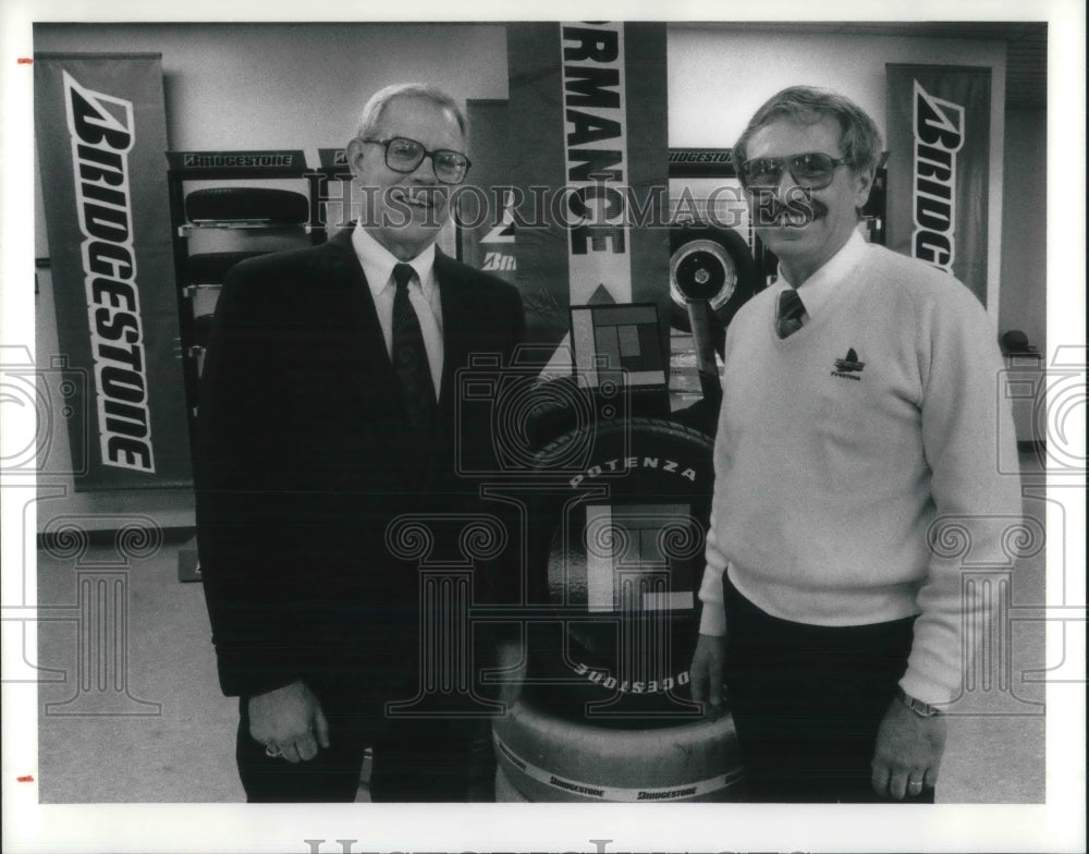 1990 Press Photo George W. Aucott, Tom Abdoo Akron Ohio Firestone Tire Store- Historic Images