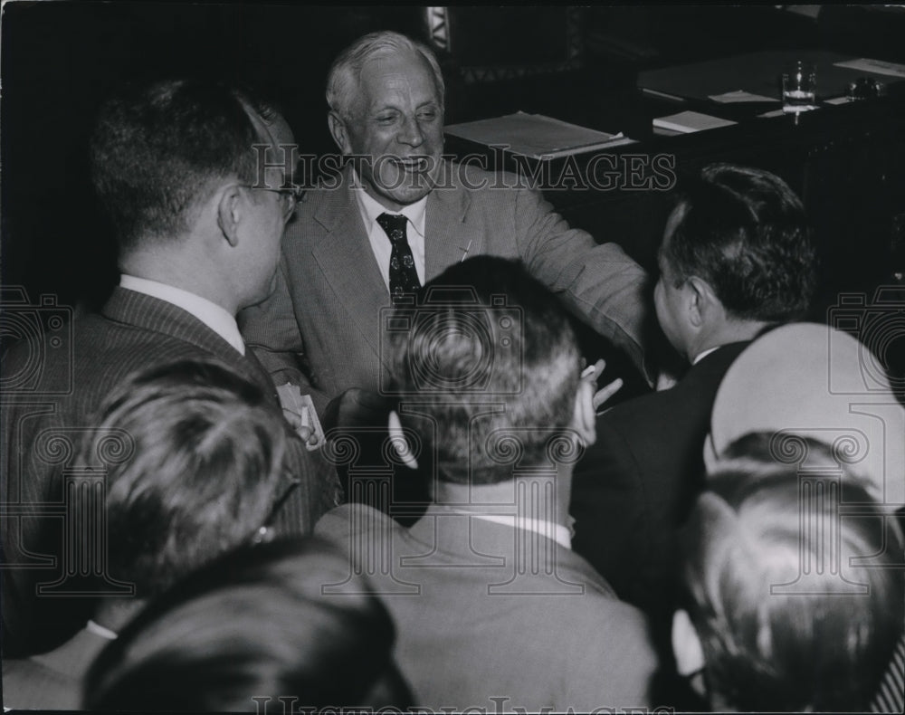 1954 Press Photo Corrigan and reporters - Historic Images