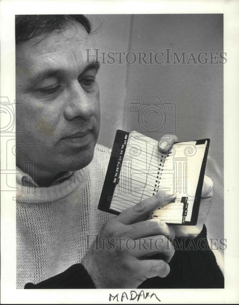 1988 Press Photo Sgt Roger Dennerel with book of names of customers from prostit- Historic Images