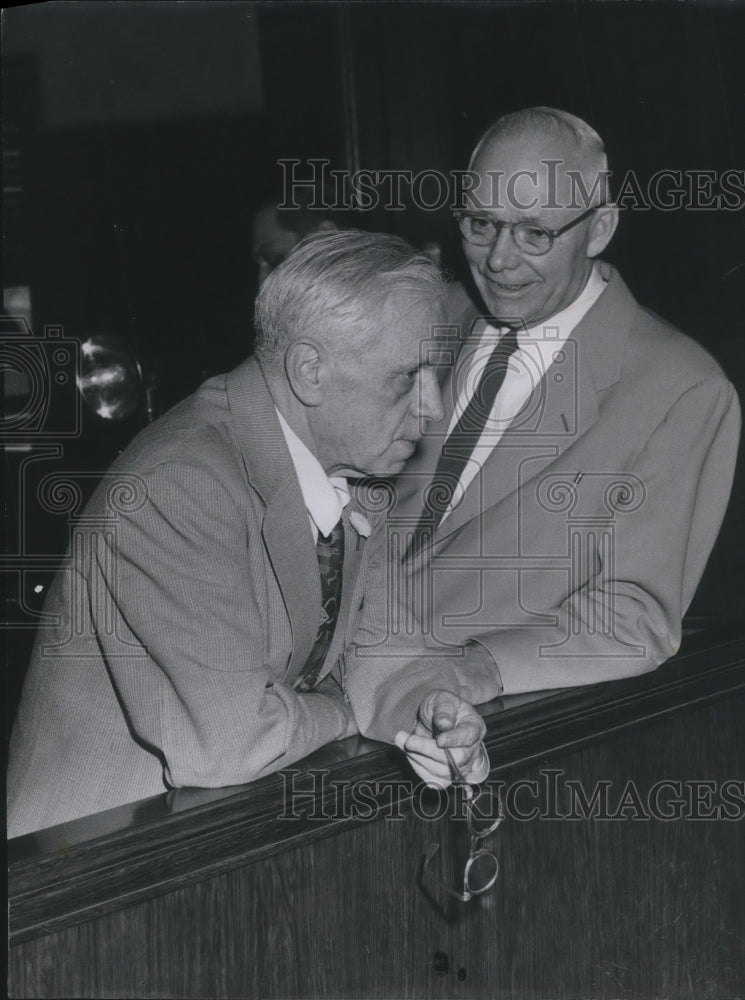 1954 Press Photo Defense Chief William J. Corrigan chats with prosc John Makron- Historic Images
