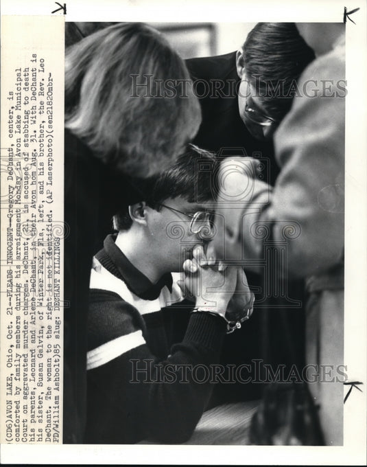 1985 Press Photo Geregory DeChantis comforted by family members during trial- Historic Images