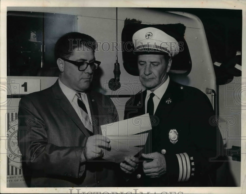 1966 Press Photo PJ DeGrandris, Jr. presents checks to Asst. Chief James Neelson- Historic Images