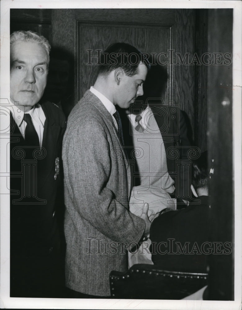 Load image into Gallery viewer, 1957 Press Photo Brian Sherwin playing fine at Cleveland Hts. Traffic Court
