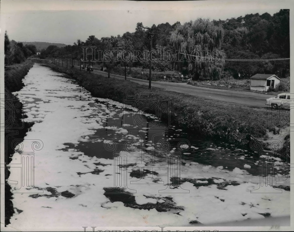 1953 Press Photo White foam formed by chemicals on Ohio Canal looking North- Historic Images