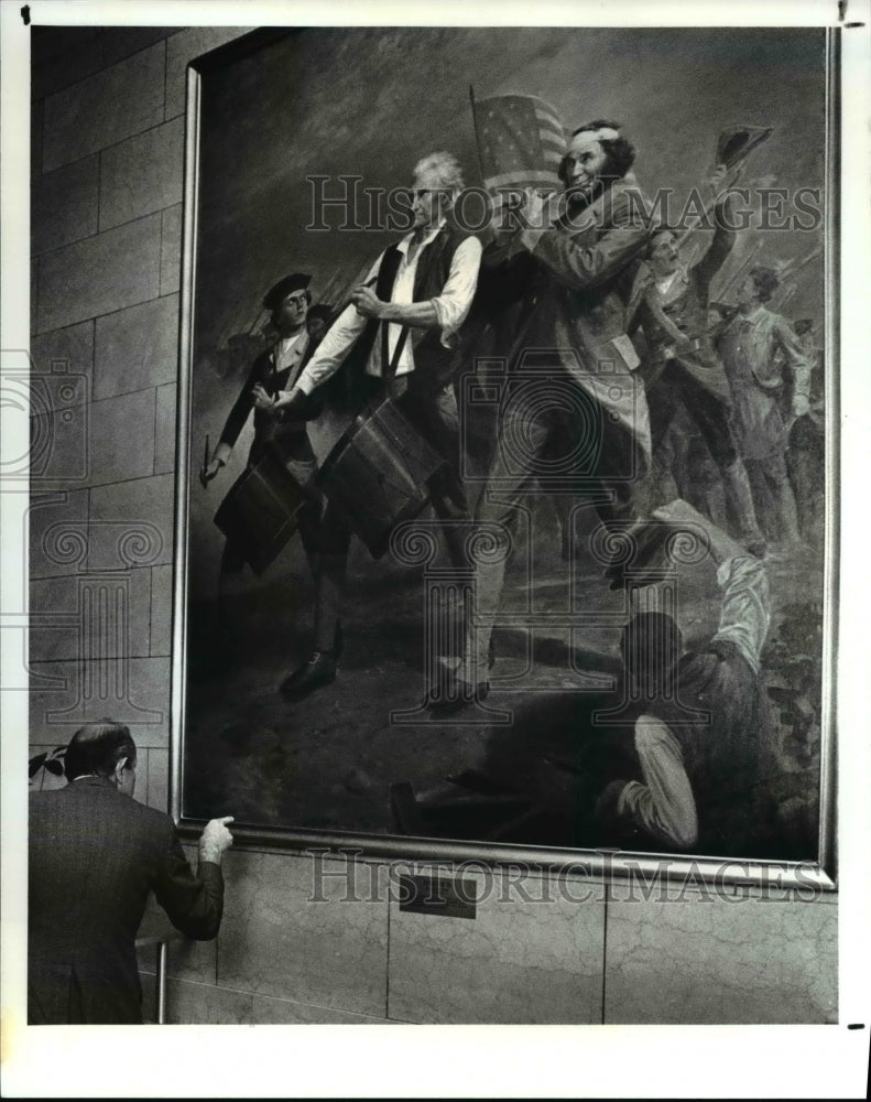 1987 Press Photo A man looks at the detail on the restored "Spirit of 1976"- Historic Images