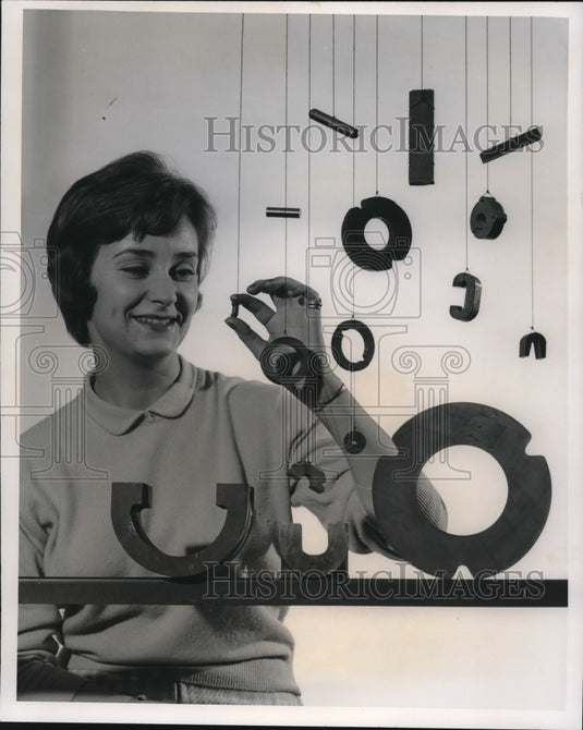 1964 Press Photo Lady with Magnets- Historic Images