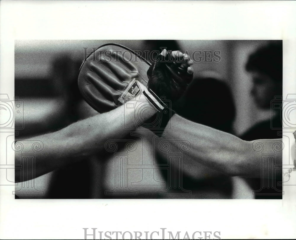 1989 Press Photo Arms of defensive cladded with two variation of the Focus Glove- Historic Images