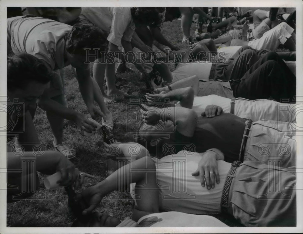 1961 Press Photo Cleve PD employees in Forehead Bottle Fill game- Historic Images