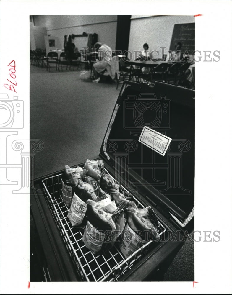 1956 Press Photo On a good day many of these cases of blood would be filled at - Historic Images