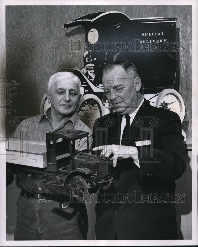 1961 Press Photo Model of a white truck is examined by J. Kostal and W. F. Jones- Historic Images