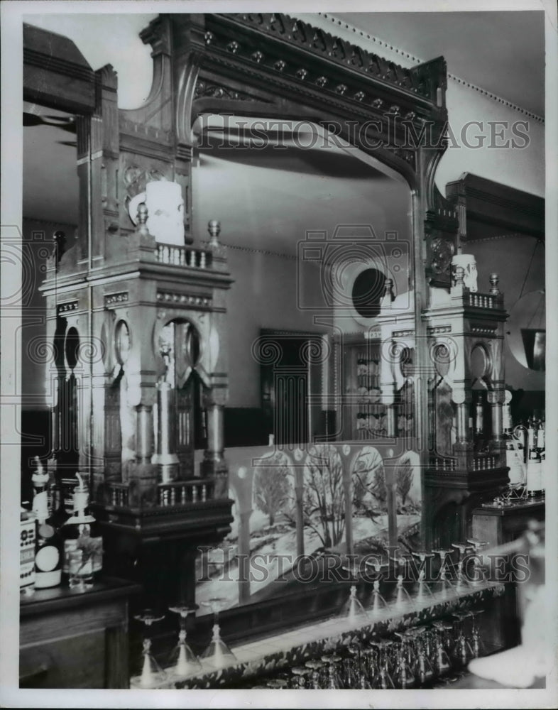 1958 Press Photo Hand-carved walnut forms the frame for this mirror, which forms- Historic Images