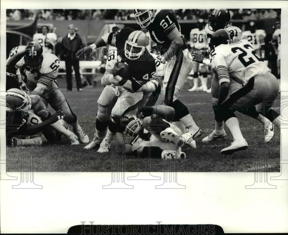 1984 Press Photo Mike Pruitt carries the ball for a first down - cvb40297- Historic Images