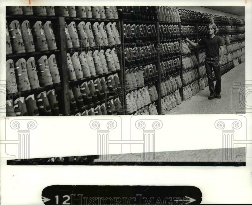 Press Photo Jeff Pickle in boot rental room at Alpine Valley - cvb47572- Historic Images