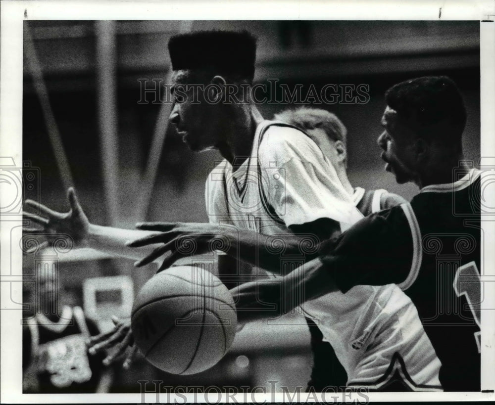 1989 Press Photo Derrick Johnson of John Hay has the ball stripped - cvb47689- Historic Images