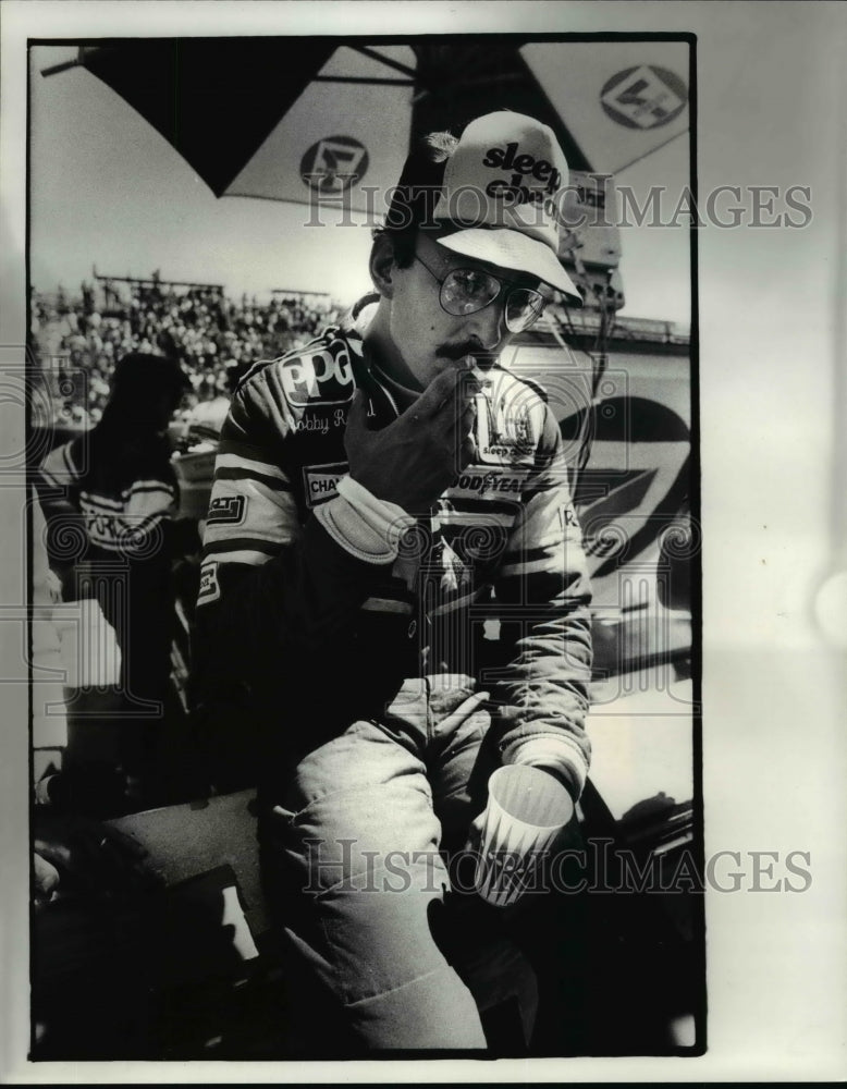 1984 Press Photo Bobby Rahal talks to the reporter after the race - cvb48689- Historic Images