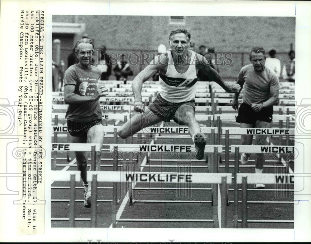 Press Photo Denver Smith, 67, wins in the 100 meter hurdles - cvb49879- Historic Images