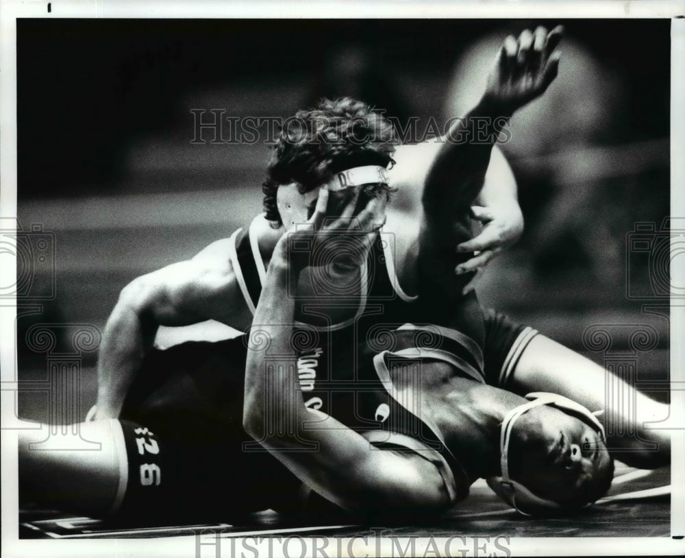 1988 Press Photo Charles Myles Uses his Hand to Fend Off Dan Donovan - cvb53024- Historic Images