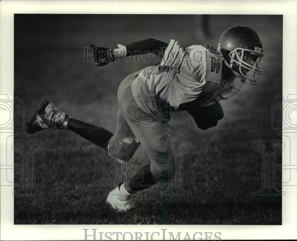 Press Photo Warrensviille Heights DeAndre Benson-football action - cvb55273- Historic Images